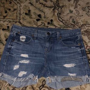 Distressed denim shorts in size 25